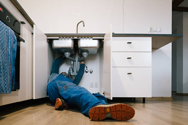 Professional Drain Cleaning technician working in Momence, IL